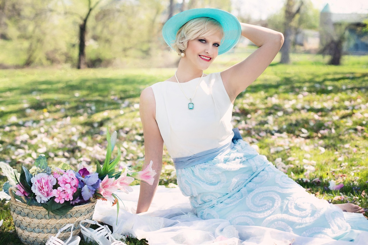 Elegant spring picnic setup with floral decorations. Elegant spring picnic setup with floral decorations.
